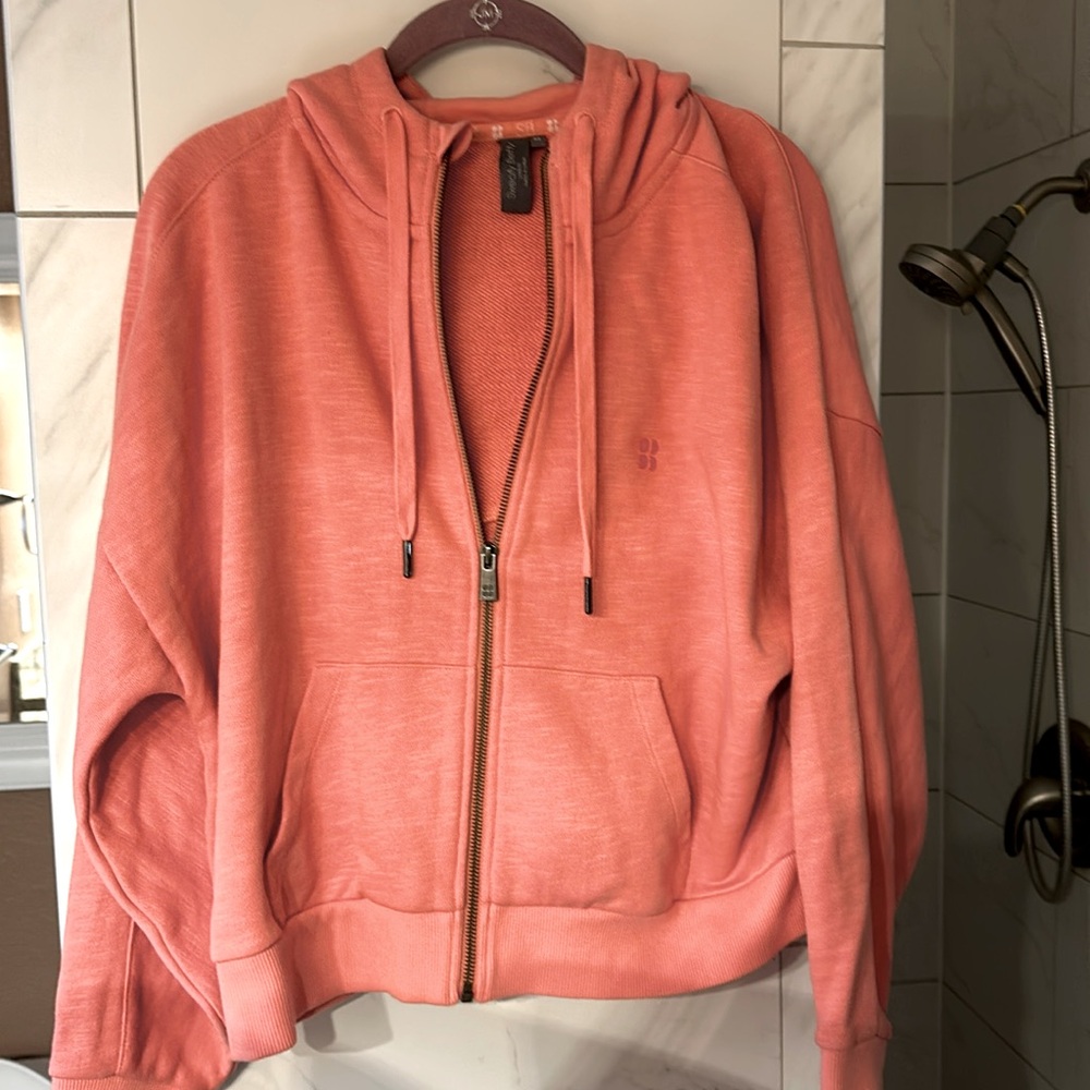 Coral Sweaty Betty zip up hooded sweatshirt, Medium